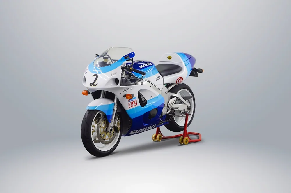 Blue and white sportbike on a neutral background
