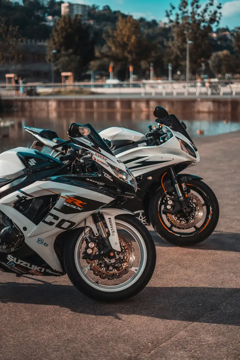 White and black sportbike on pavement